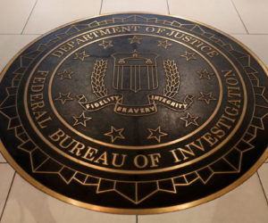 FILE PHOTO: The Federal Bureau of Investigation seal is seen at FBI headquarters in Washington